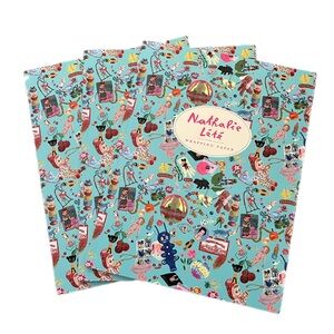 Nathalie Lété wrapping paper sheets book and matching sticker sheet. IN STOCK!